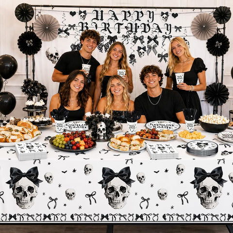 Hanging bow and skull swirl decorations