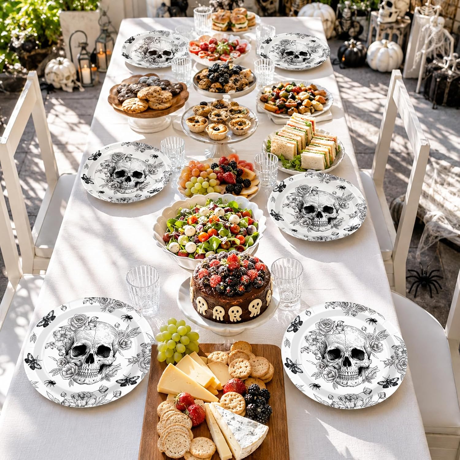 Gothic Halloween disposable plates with spider and moth illustrations