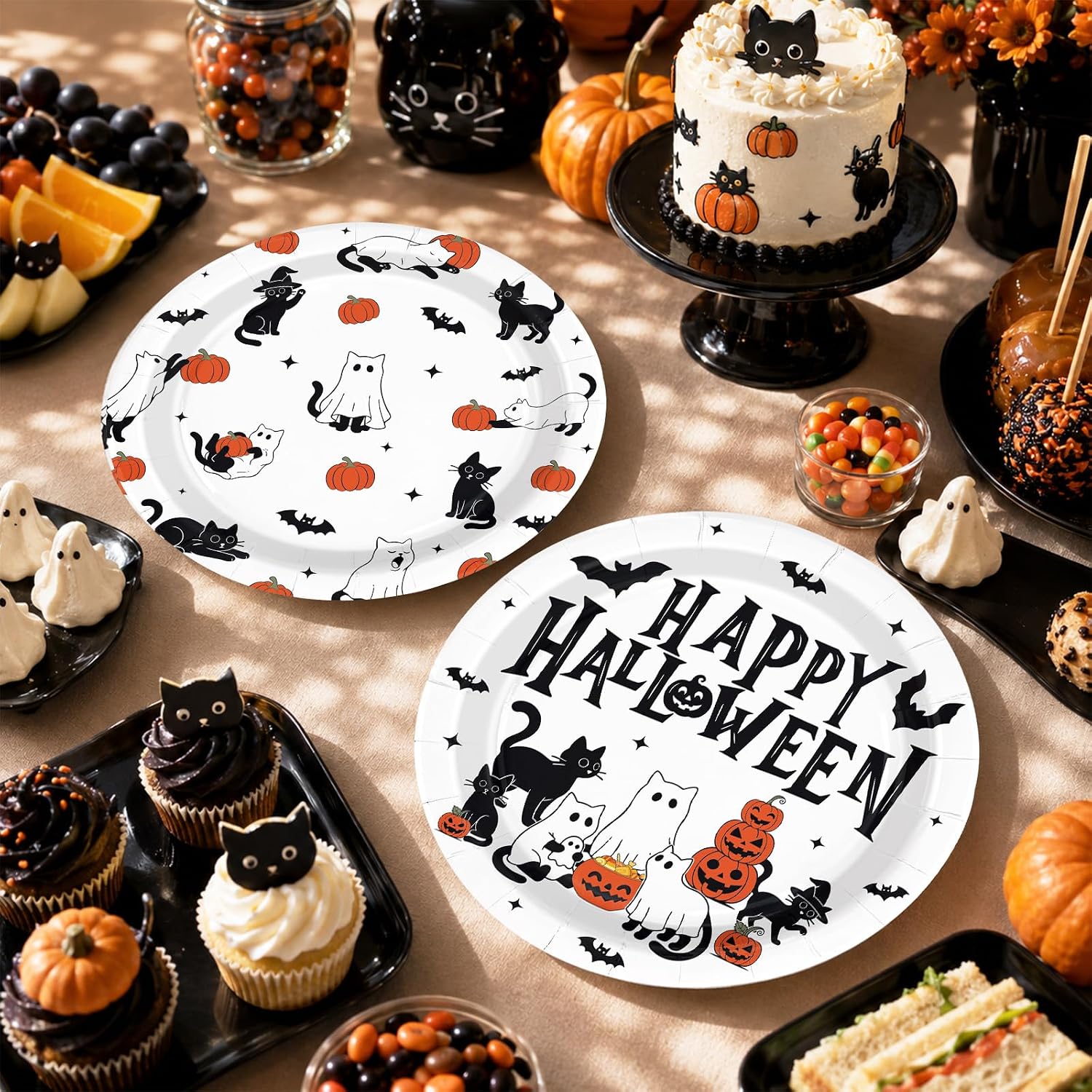 Halloween cat plate on a dessert table with pumpkins