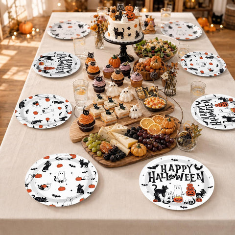 Halloween party table styled with the cat paper plates