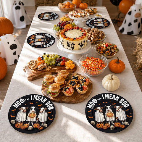 Dinner table set with the skeleton cow paper plates