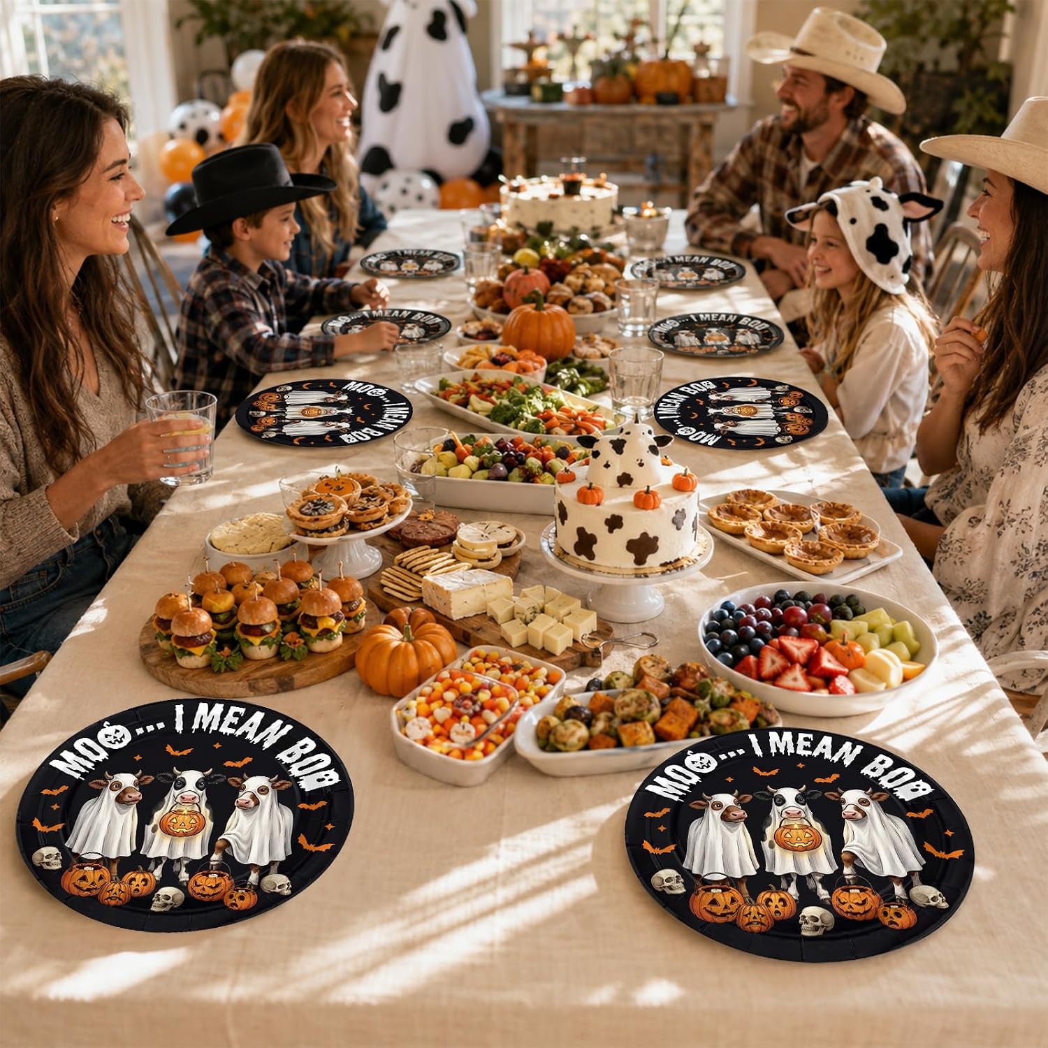 Fall Halloween table styled with the ghost cow plates