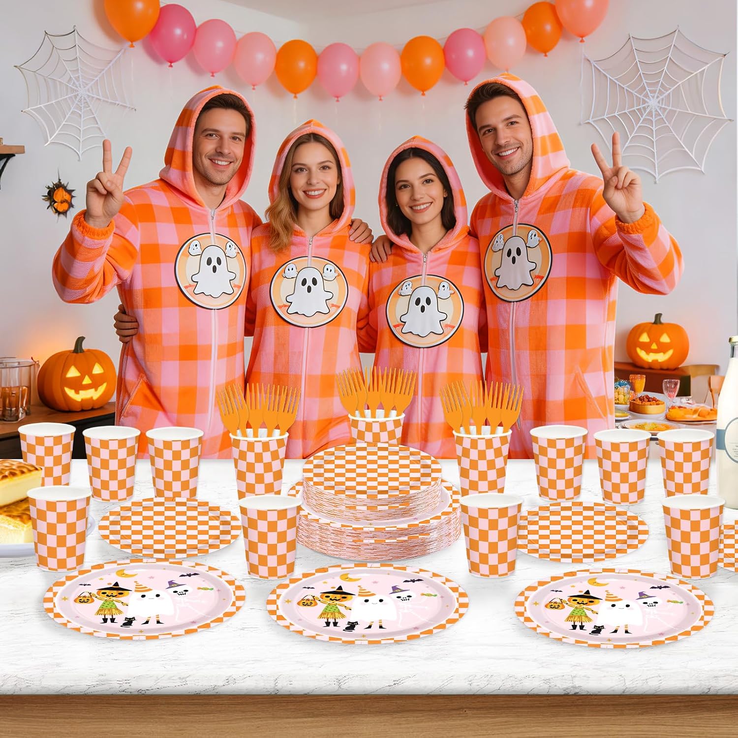 Guests in orange plaid holding the Halloween ghost plates