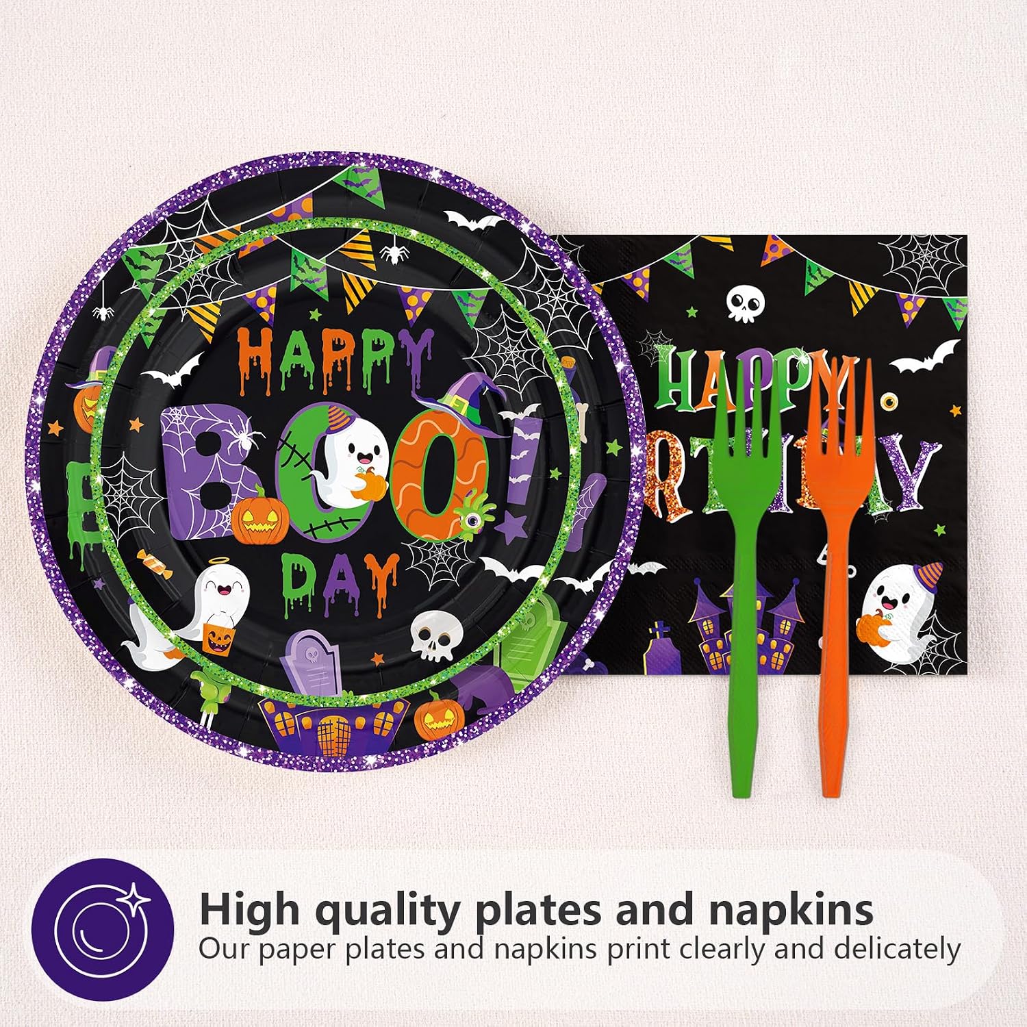 Green purple happy boo day plates and napkins flat lay