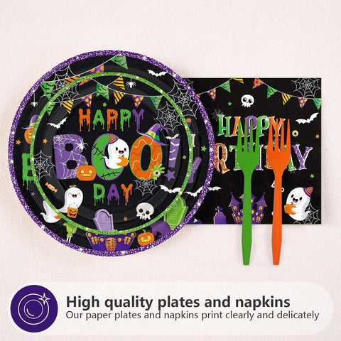 Green purple happy boo day plates and napkins flat lay