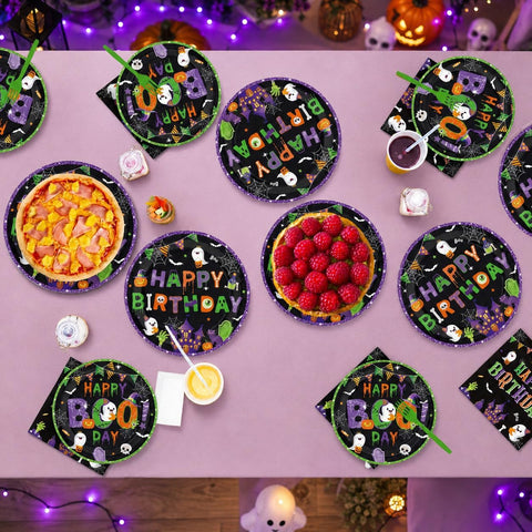 Halloween birthday table styled with the ghost set