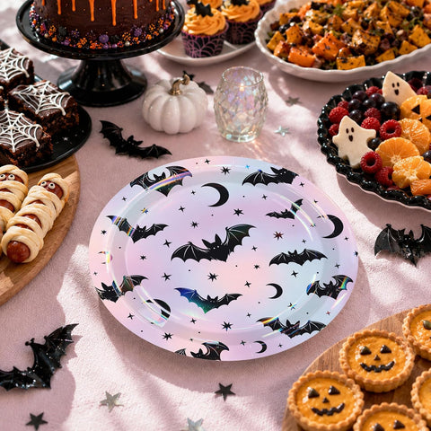Halloween table styled with the holographic bat plates