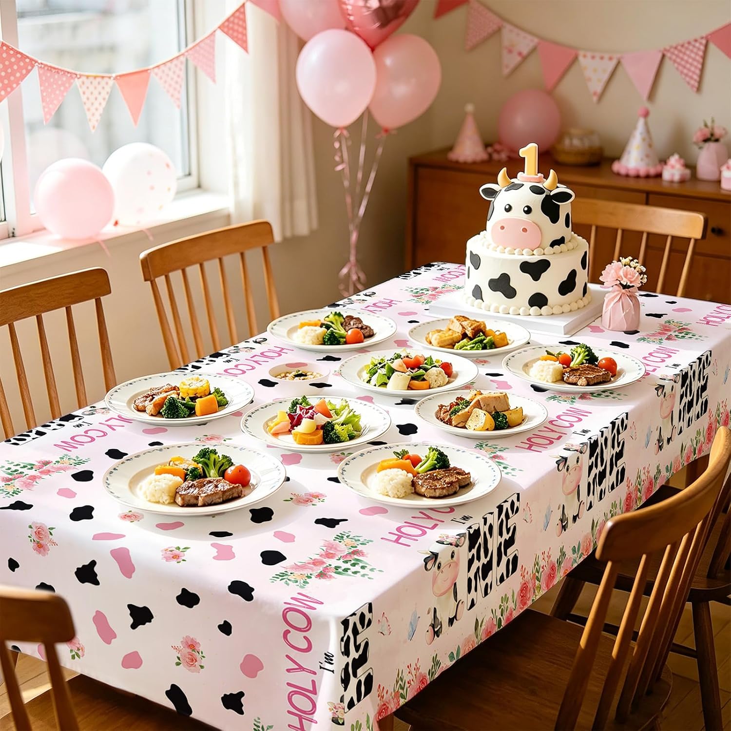 Girls 1st birthday farm baby shower scene with cow print tablecloth