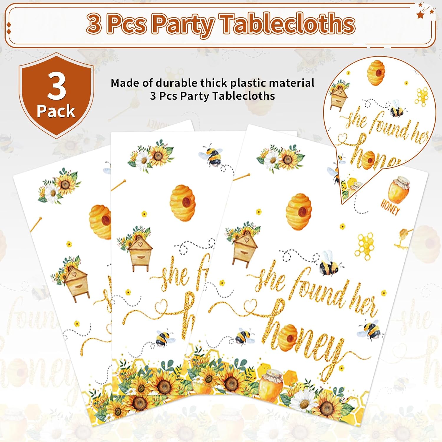 Bridal tablecloth draped on party table with bee themed decorations