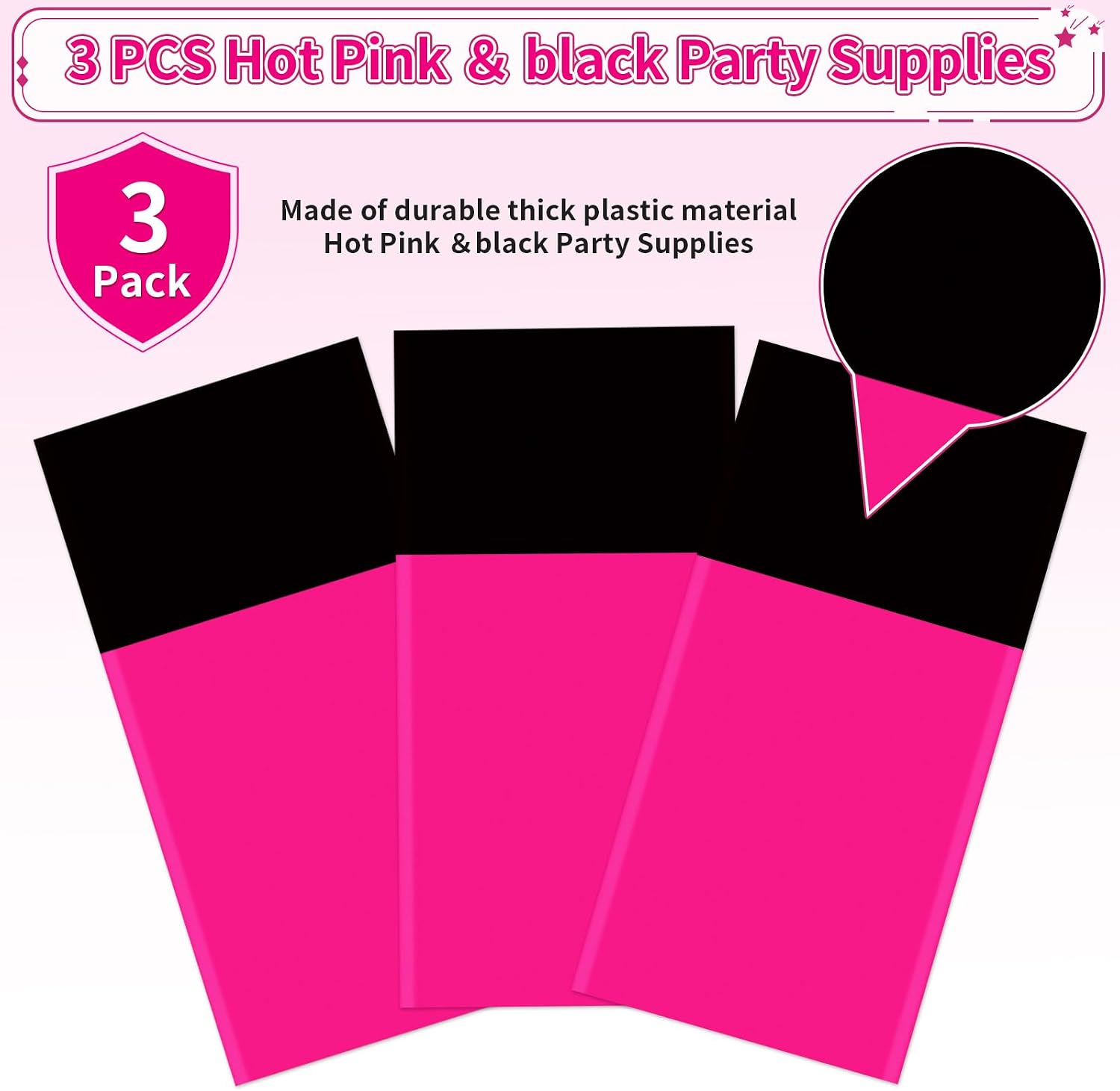 Hot pink tablecloth draped on party table with black themed decorations