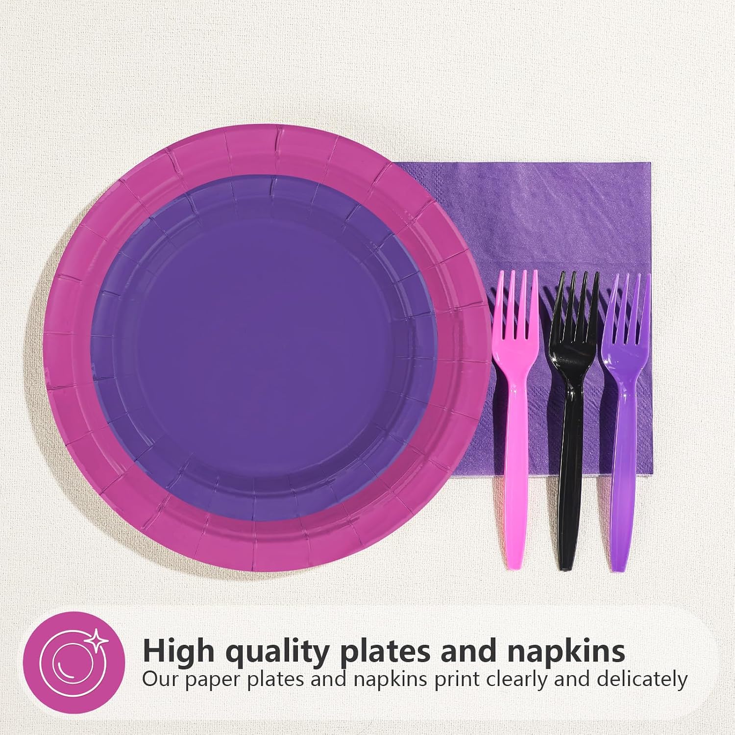 Purple dinner plate on a pink plate with pink fork and napkin