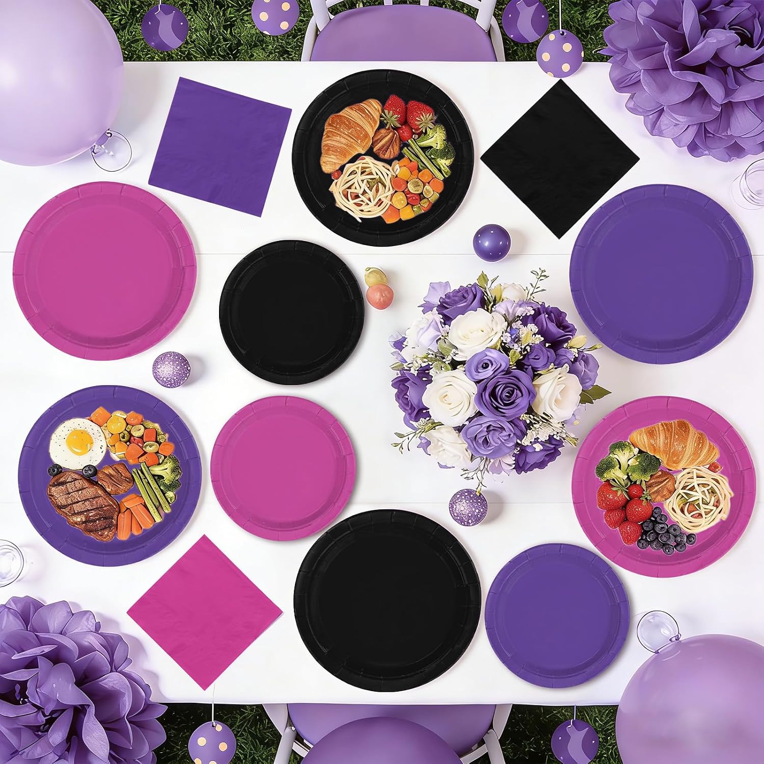 Pink purple and black plates with party food and flowers