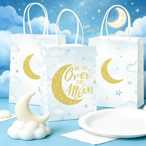 Over The Moon paper gift bag with handles and star moon design