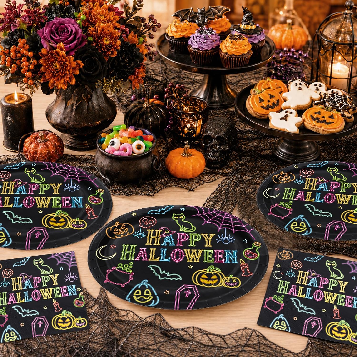Halloween table styled with the neon oval plates and napkins