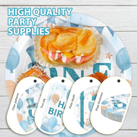 Stack of blue and white 1st birthday themed plates and napkins