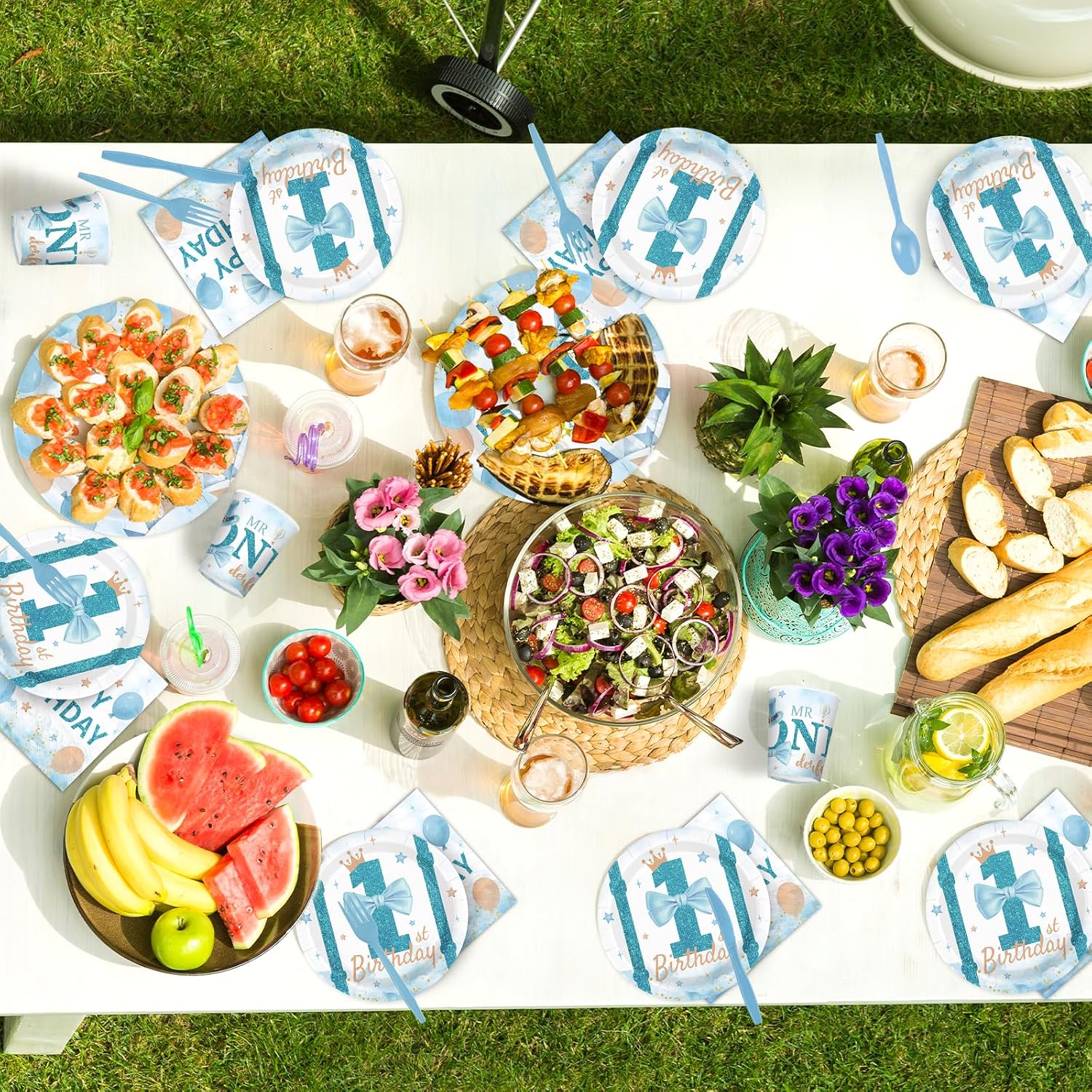 Baby boy 1st birthday party table with Mr Onederful tableware