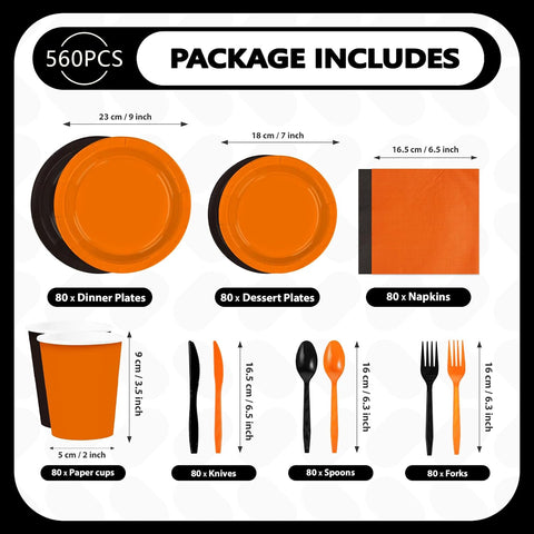 Solid orange and black party plates stacked
