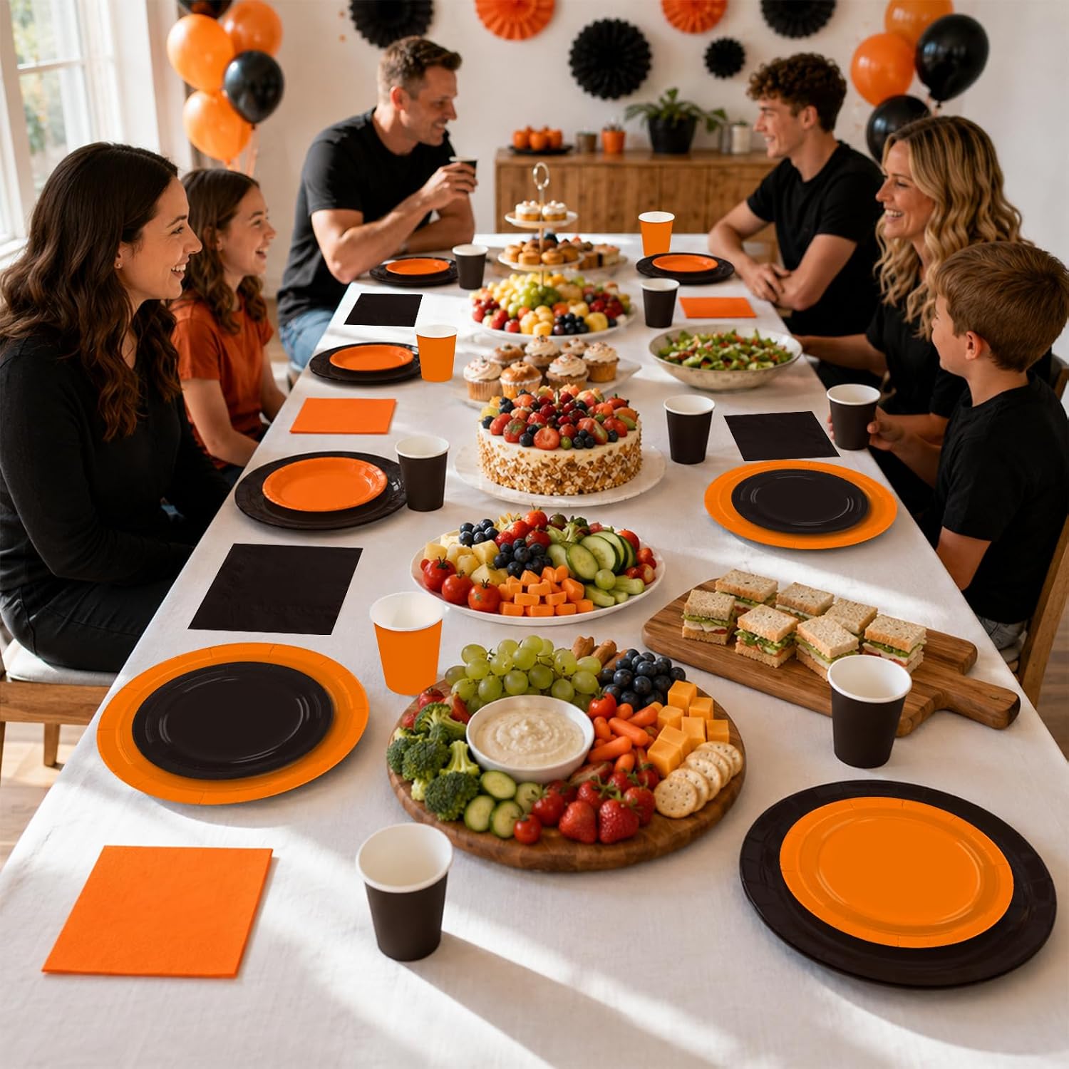 Large black and orange party table layout