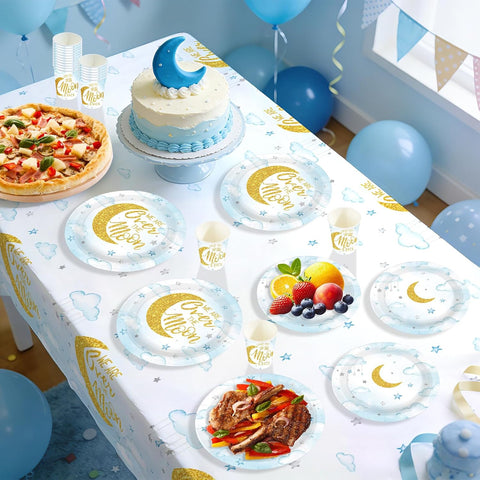 Over The Moon baby shower table with pastel blue tableware