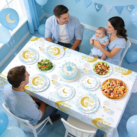 Gender reveal party scene with moon and stars tableware