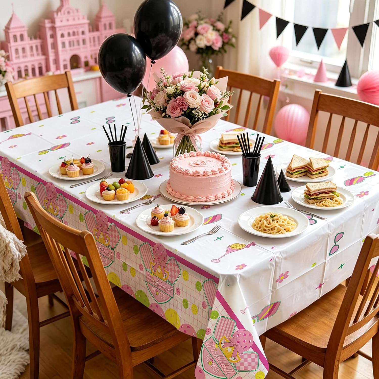 Pickleball tablecloth draped on party table with sports themed decorations