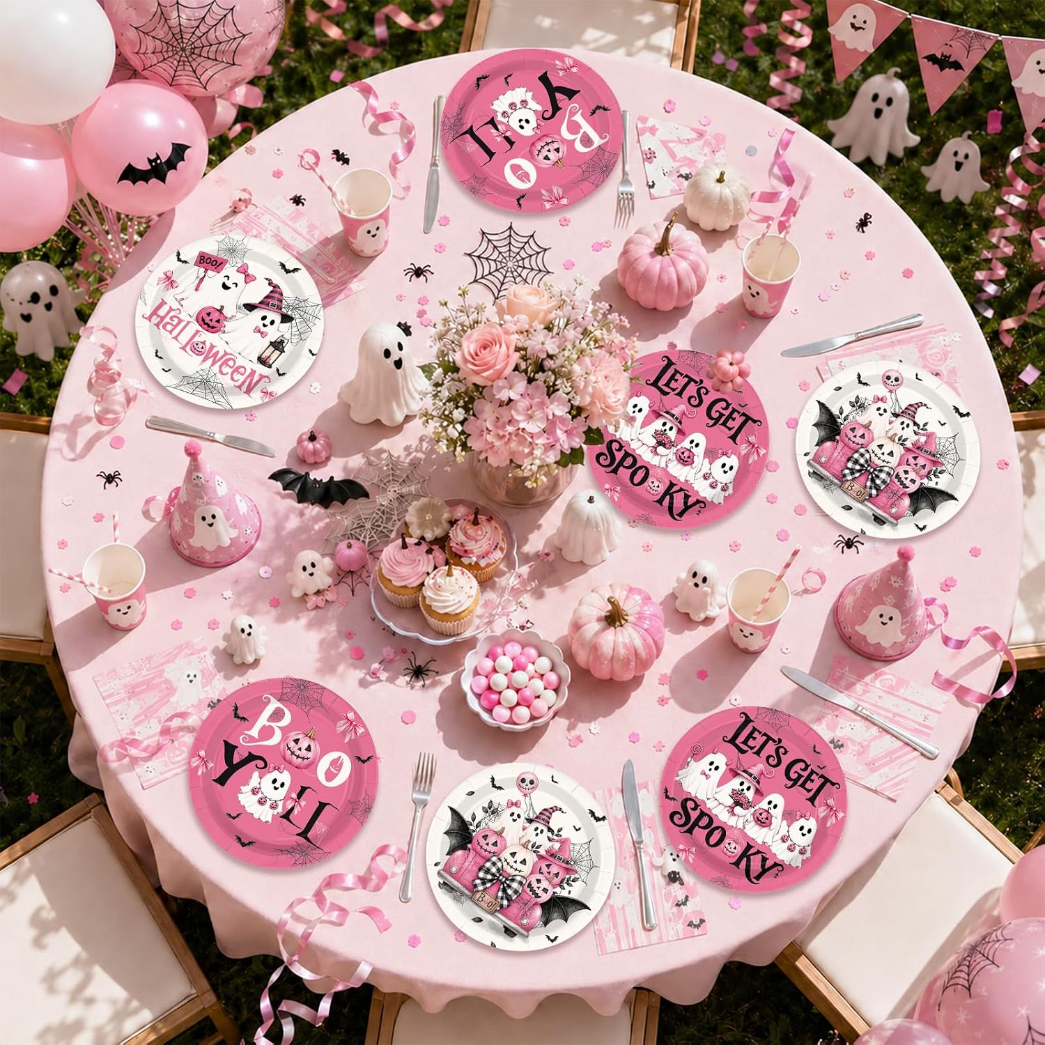 Pink Halloween party table styled with the 60 paper plates