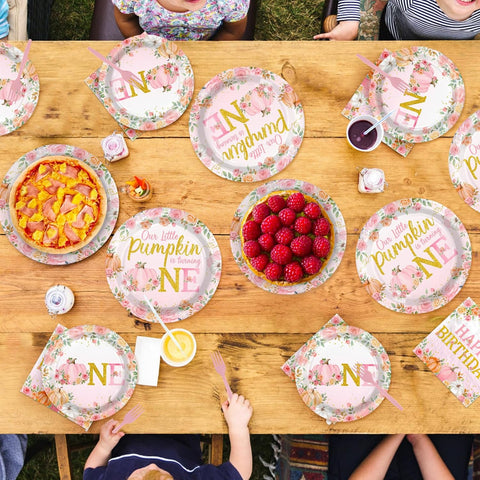 Fall first birthday table styled with the pumpkin tableware