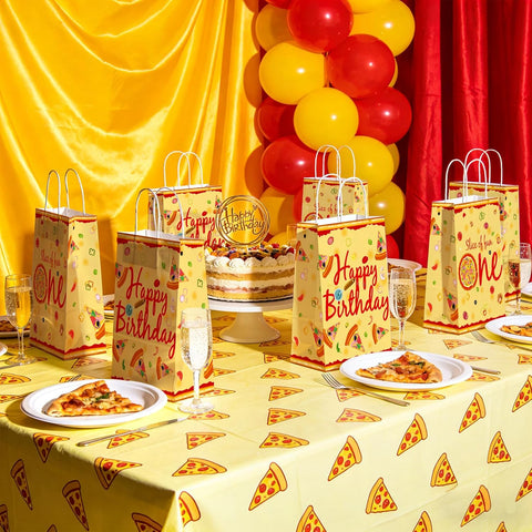 Boys girls first birthday party scene with pizza themed goodie bags