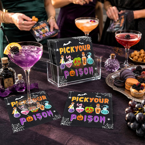 Spooky Halloween napkins arranged on a drinks table with candles