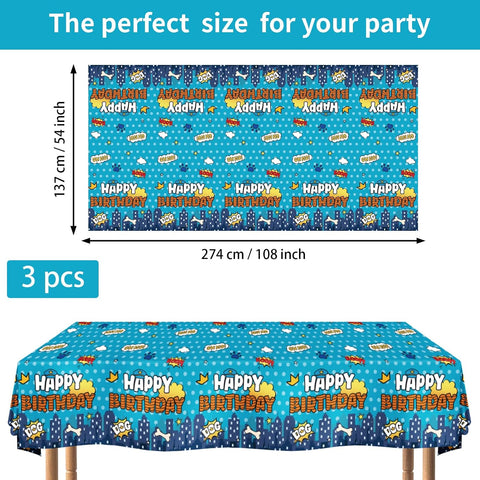 Flat lay of three police dog birthday tablecloths with cartoon hero dogs