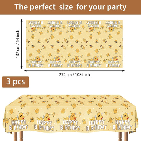 Potato birthday tablecloth draped on party table with chip themed decorations