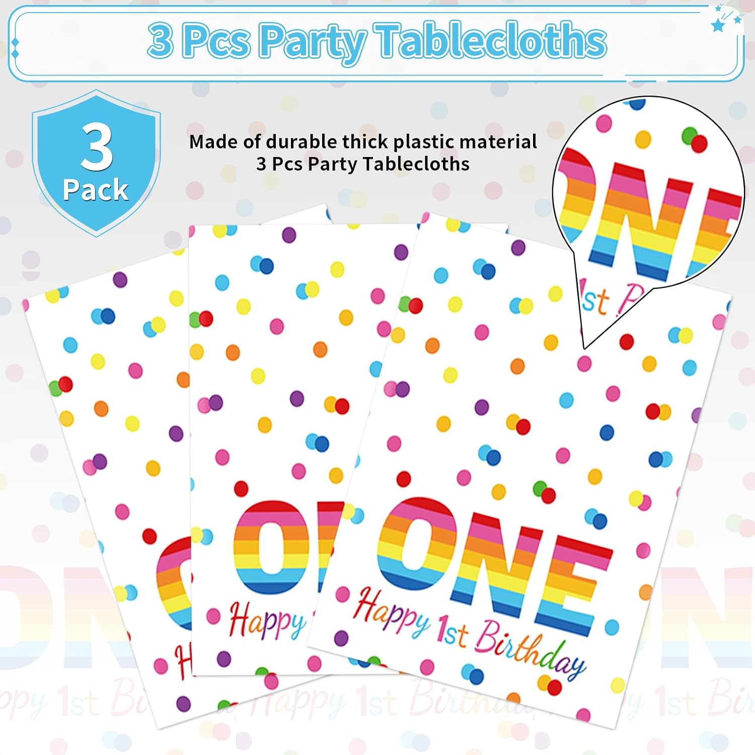 Rainbow 1st birthday tablecloth draped on party table with colorful decorations