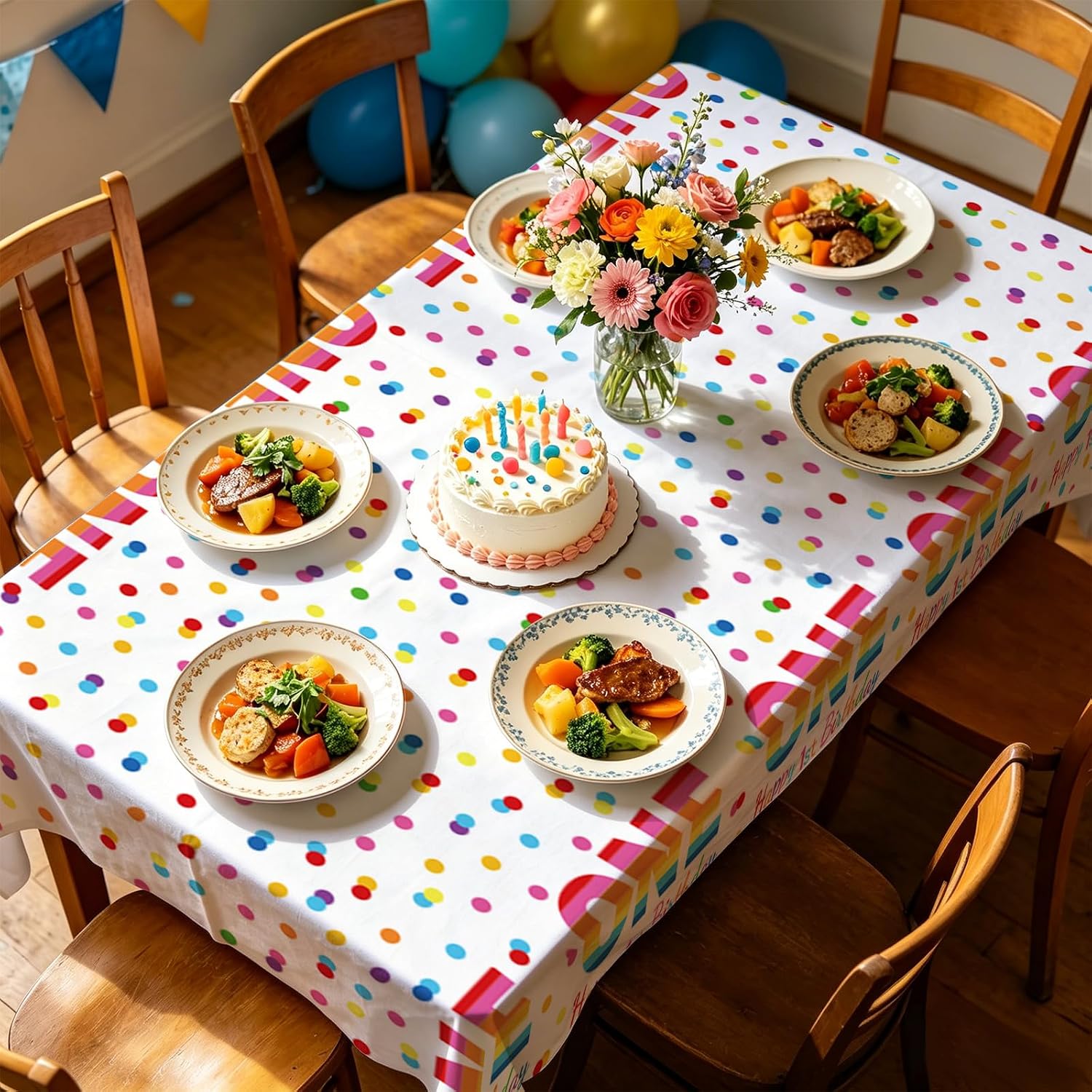 Girls boys 1st birthday party scene with rainbow confetti tablecloth