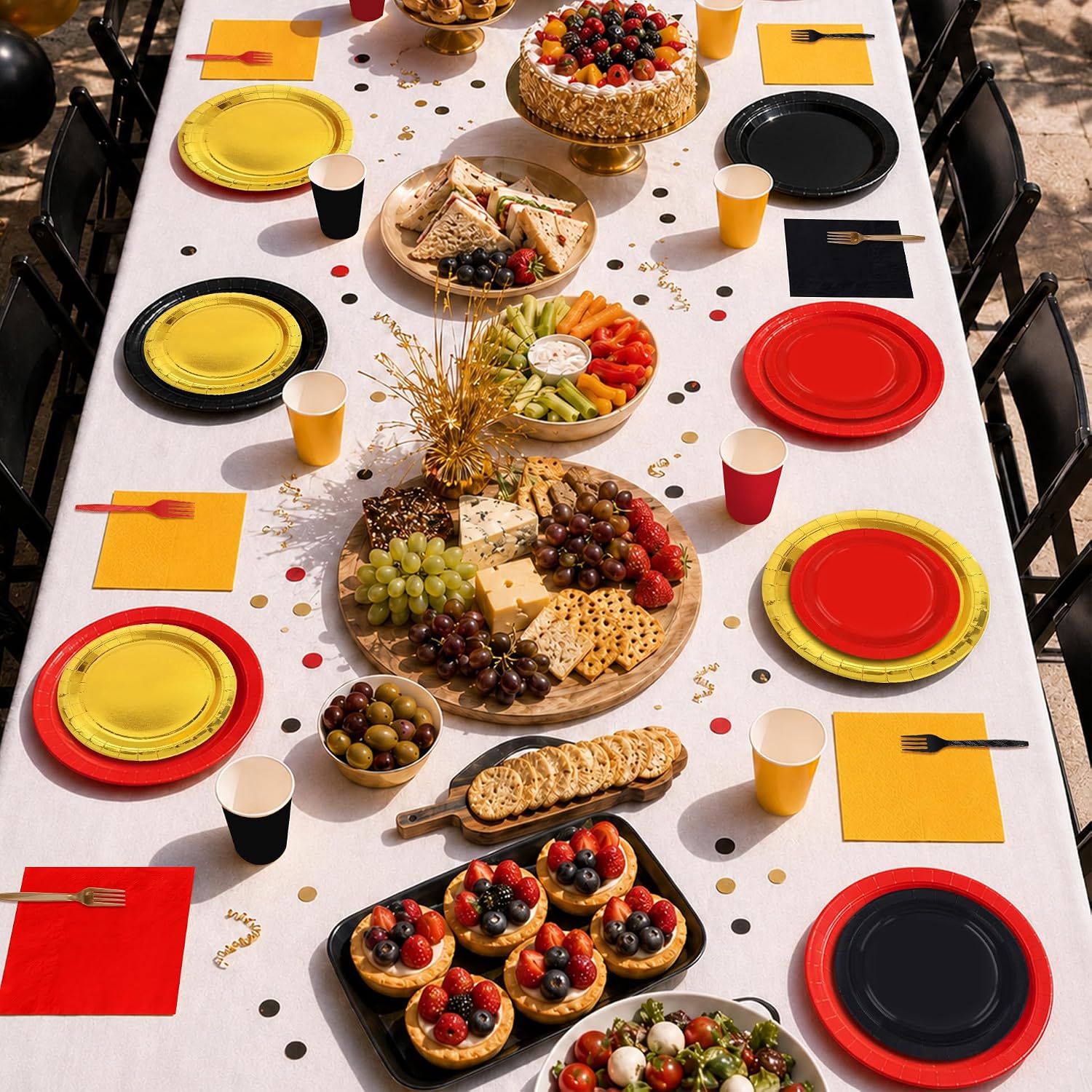 Red black gold place setting with the party plates