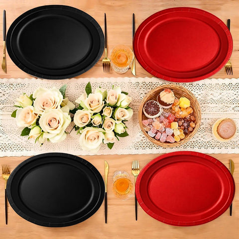 Party table styled with the red and black oval paper plates