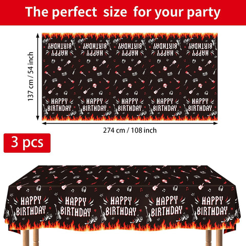 Flat lay of three rock and roll tablecloths with music theme