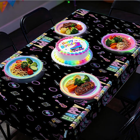Boys girls roller skate birthday party scene with neon tablecloth