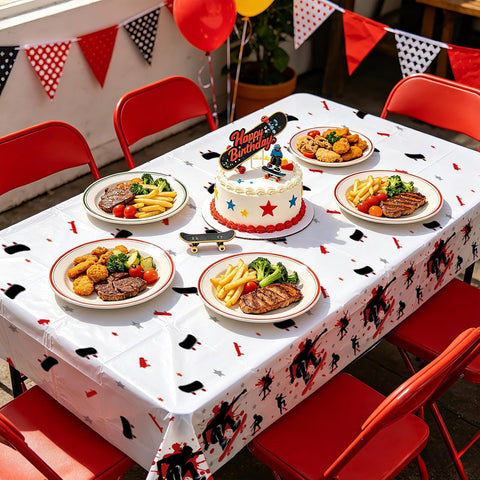 Boys skateboard birthday party scene with sports themed tablecloth