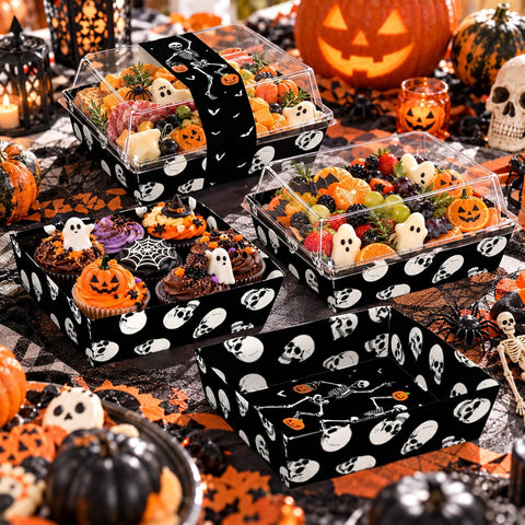 Assembled treat boxes styled on a Halloween table