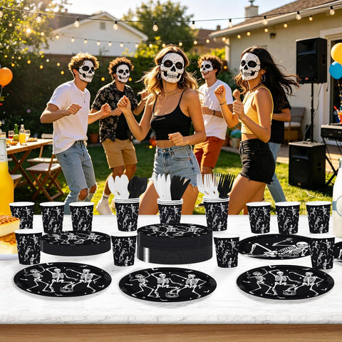 Halloween party guests holding the skeleton paper plates