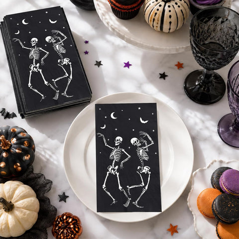 Folded Halloween napkin showing the crescent moon and bat border
