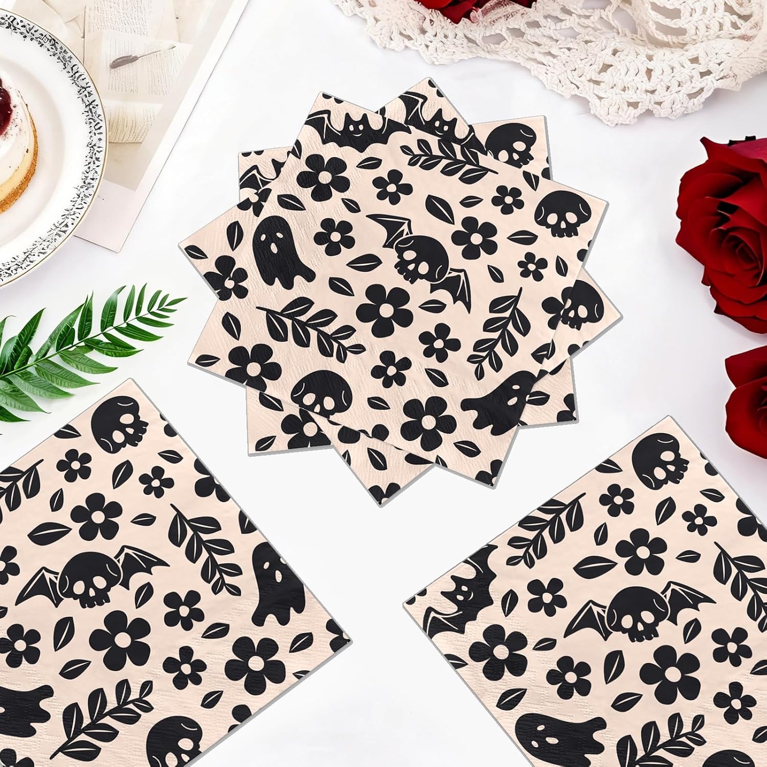 Black and cream skull floral cocktail napkins flat lay