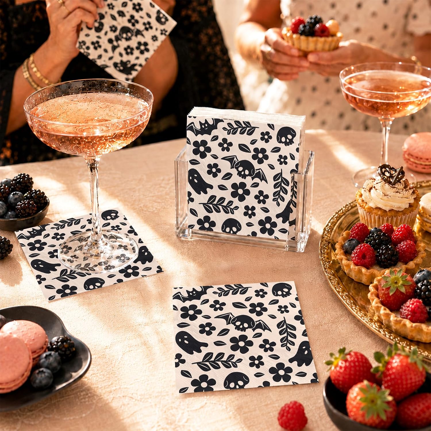 Skeleton cocktail napkins styled with pink drinks