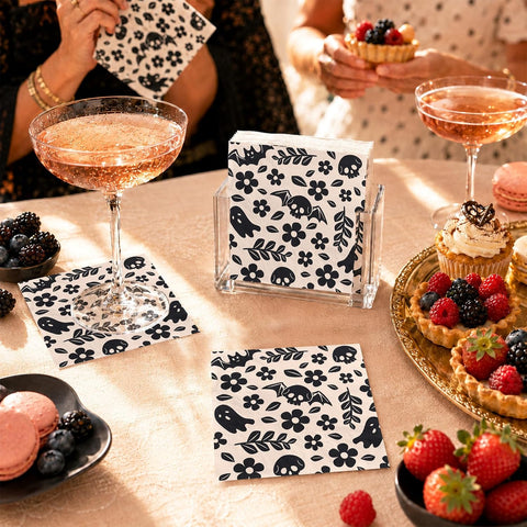 Skeleton cocktail napkins styled with pink drinks
