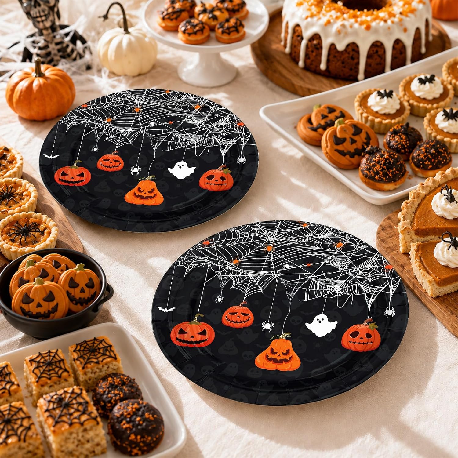 Halloween table styled with the spiderweb plates