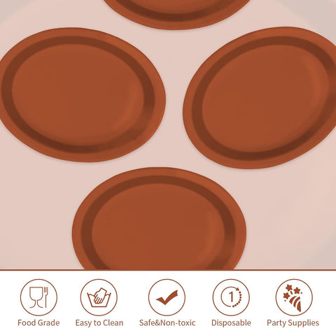 Solid terracotta oval plates stacked for a fall table setting