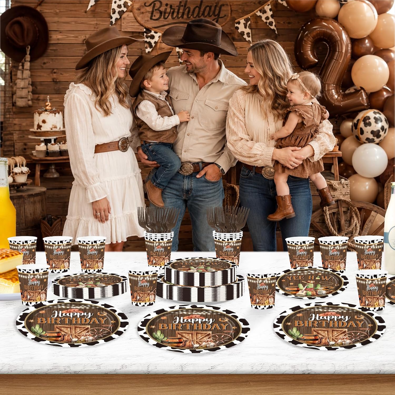 Cowboy birthday party table with rodeo tableware
