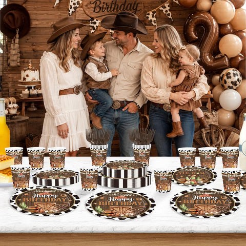 Cowboy birthday party table with rodeo tableware