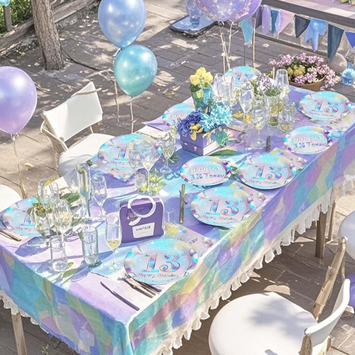 Iridescent 13th Birthday Table Setting with Plates Napkins and Forks Displayed