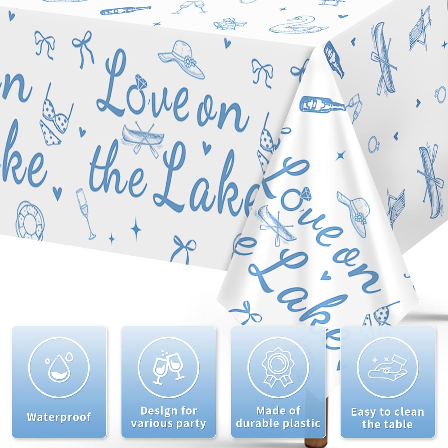 Close-up of engagement plastic tablecloth with Love on the Lake lettering